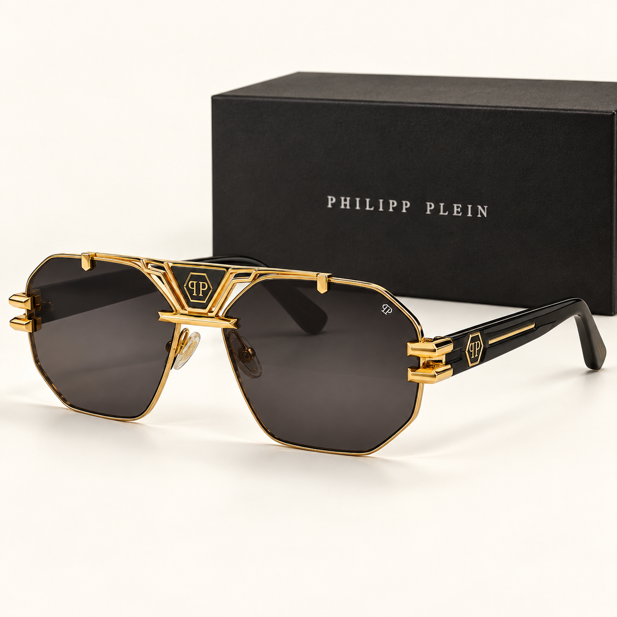 PP — Gold Smoke Navigator Sunglasses – Model 2 — front-left view with brand box