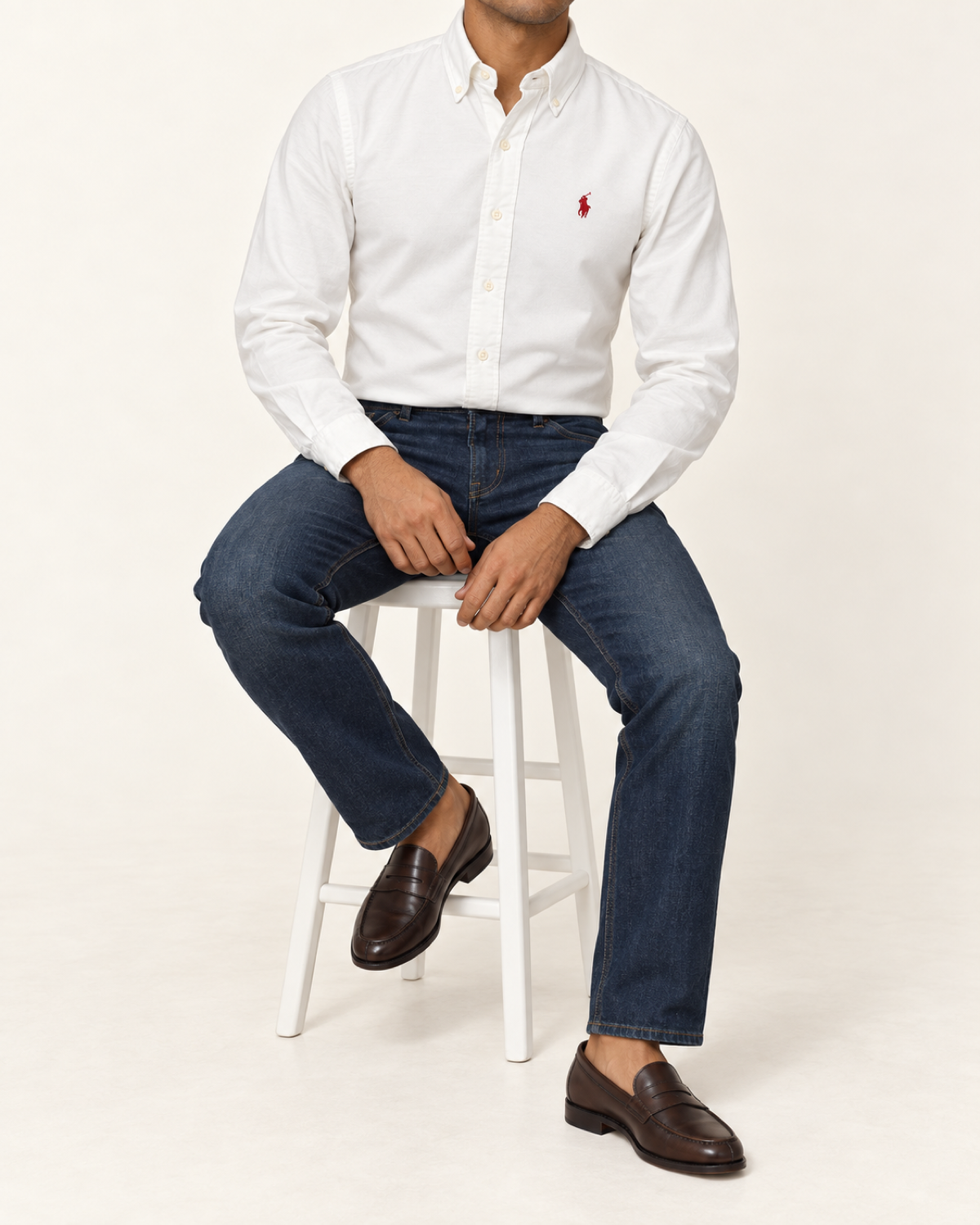 RL — White Button-Down Shirt With Red Embroidery — seated full body
