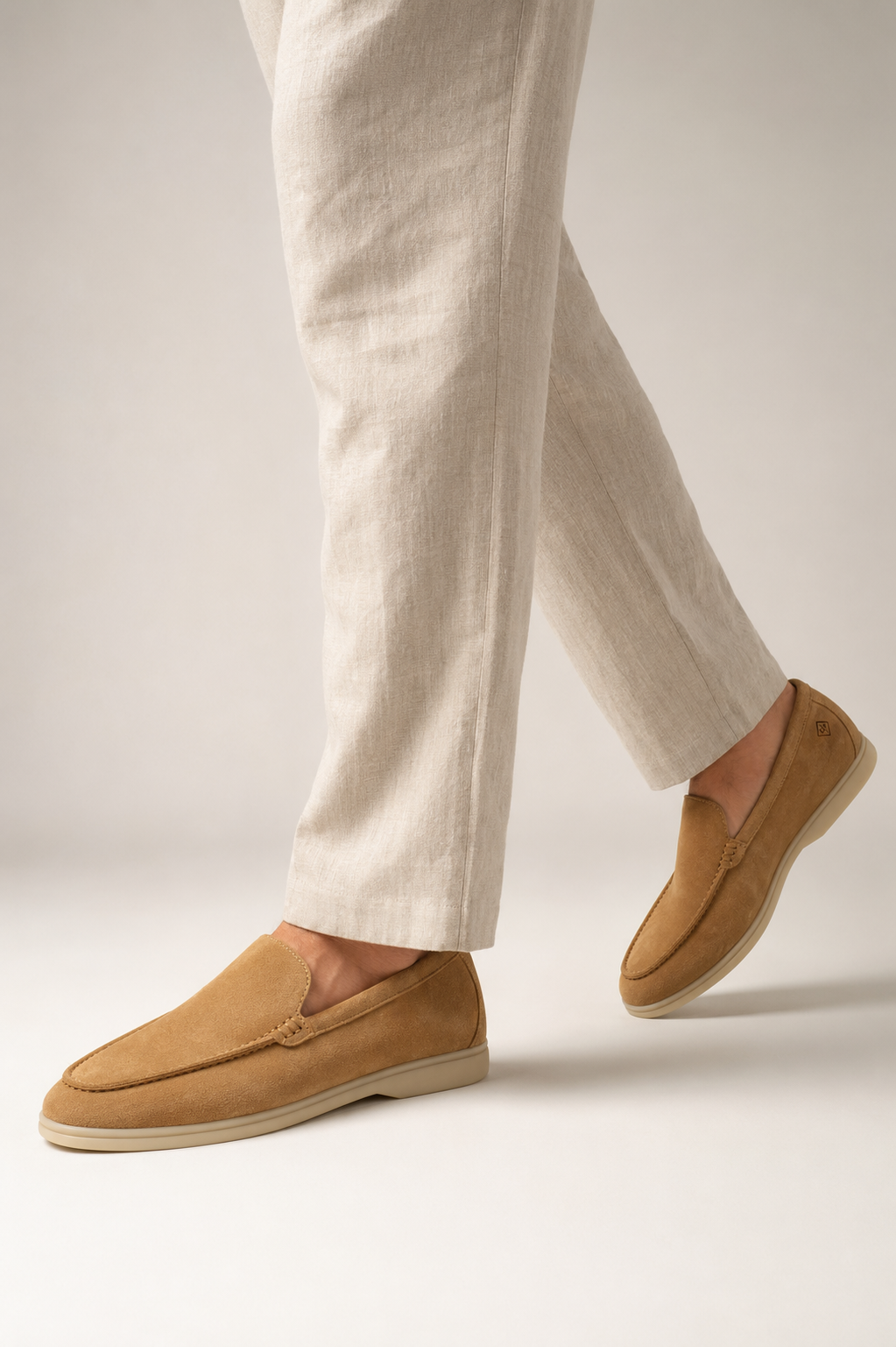 Men’s Apricot Suede Loafers - man walking in camel suede loafers