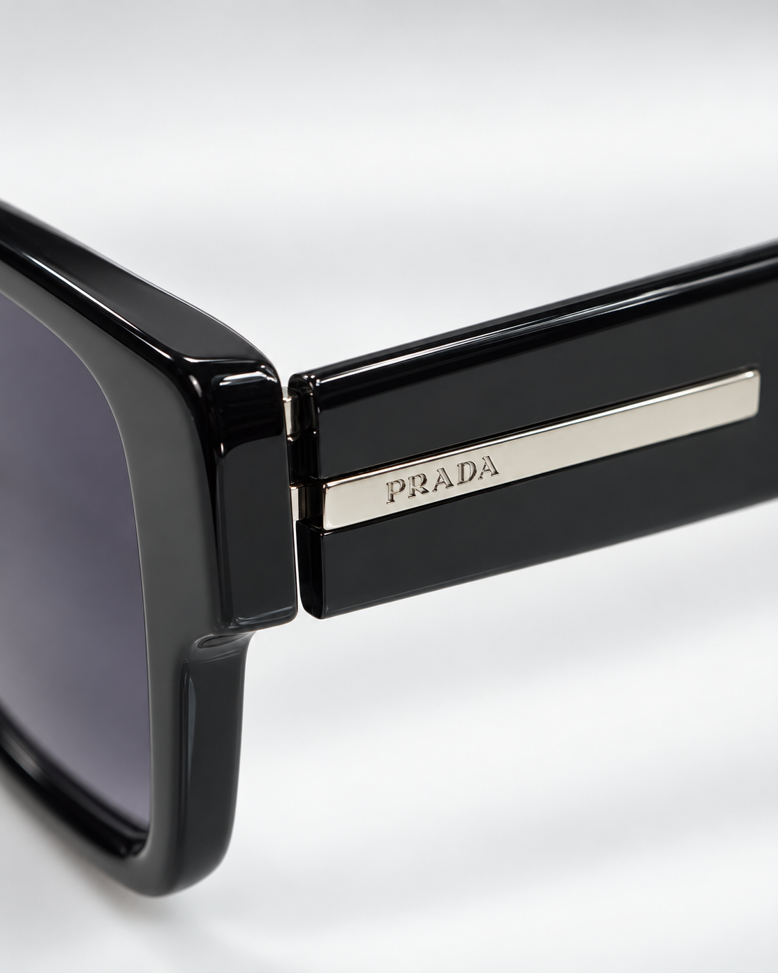 prada sunglasses luxury set — close up logo detail