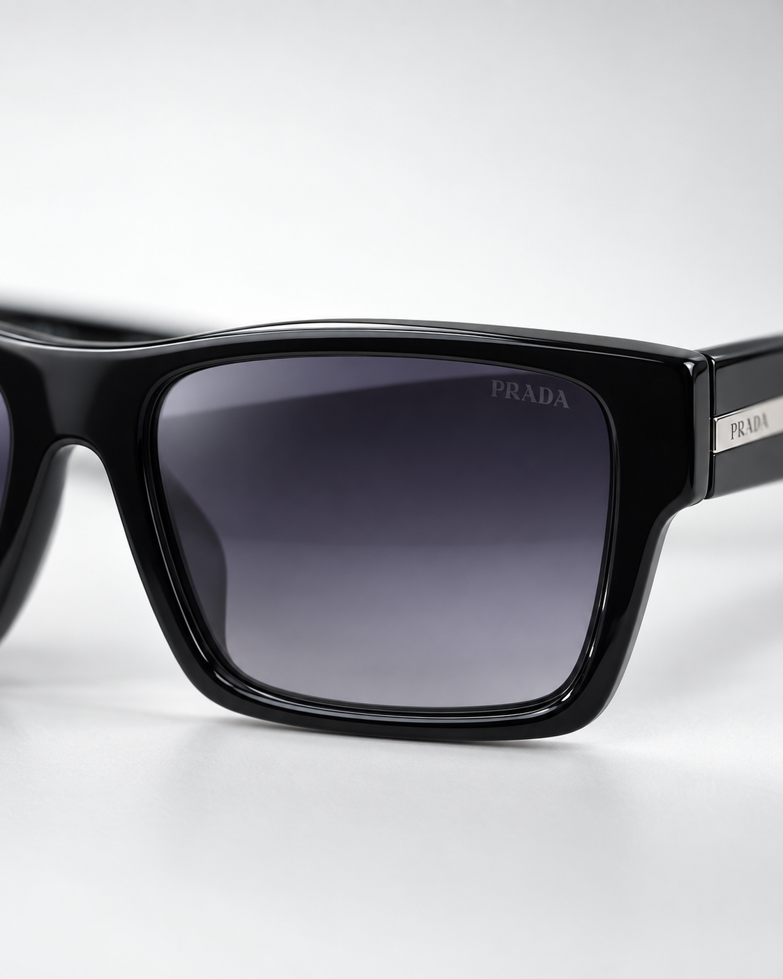 prada sunglasses luxury set — lens branding close up