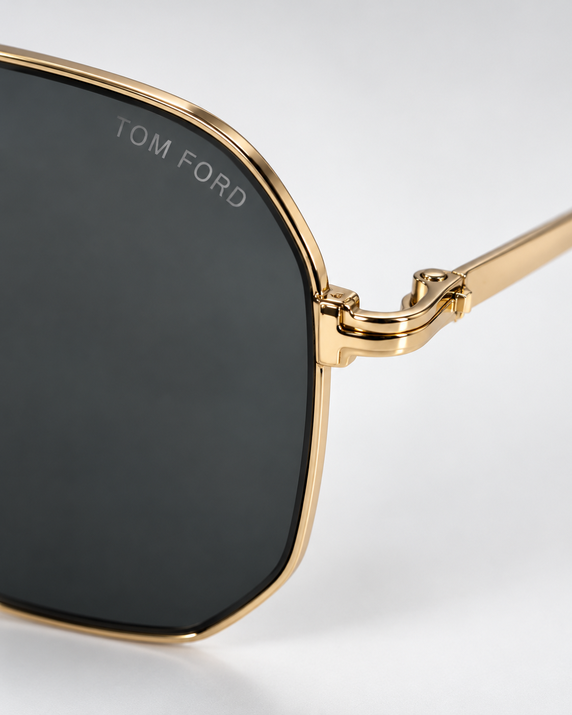 tom ford ft0852 28a gold navigator sunglasses — logo hinge detail