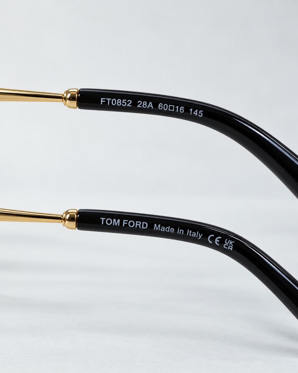 tom ford ft0852 28a gold navigator sunglasses — inner temple detail