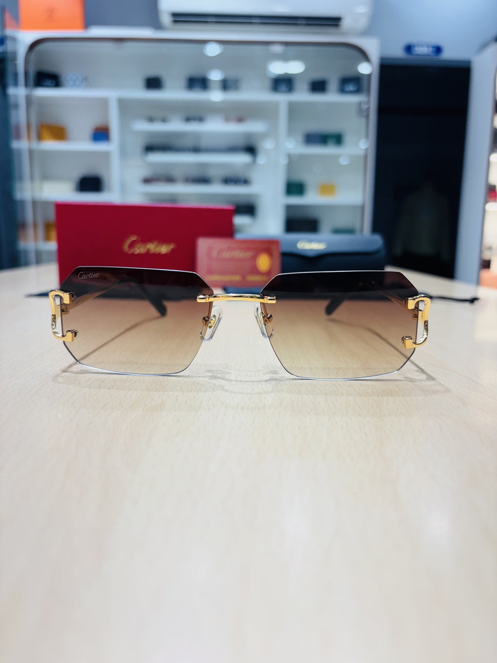 CR — Brown Gradient Geometric Rimless Sunglasses – Model 12 - actual product photograph 1