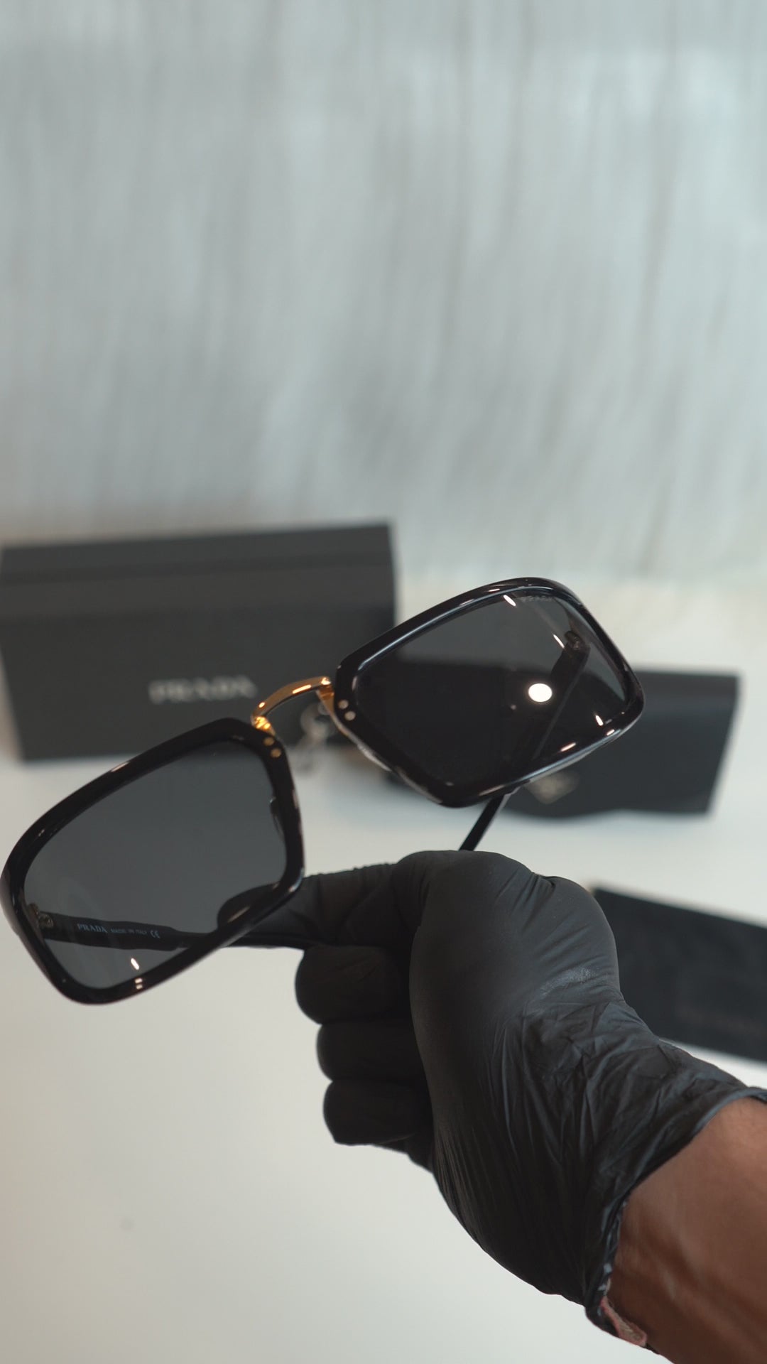prd spra11 glossy black gold detail rectangular sunglasses — upright product details, no audio